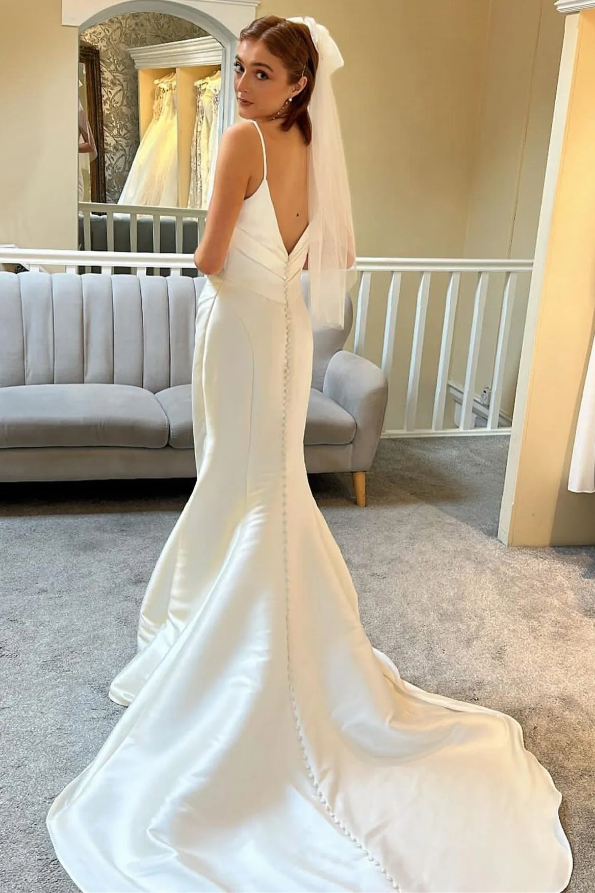 Ivory Spaghetti Strap Backless Trumpet Long Wedding Dress